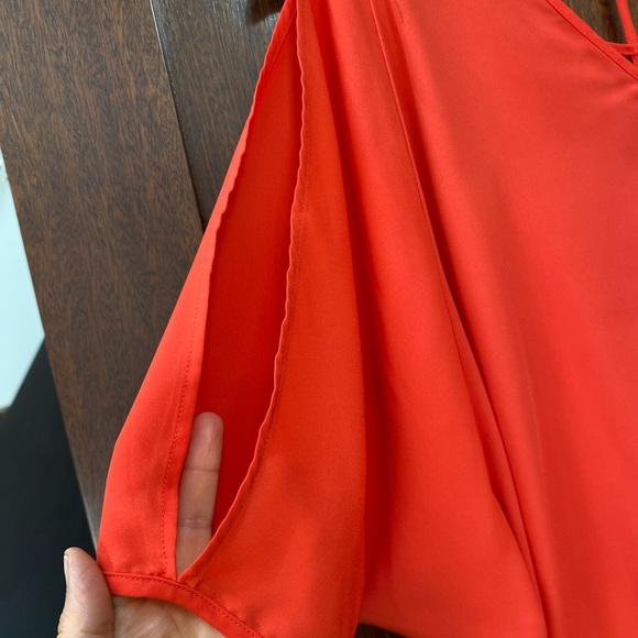 XOXO red/orange blouson top with criss-cross detail on back. - Picture 4 of 7
